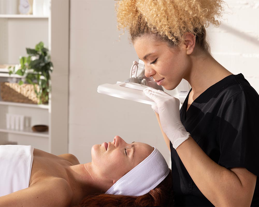 Electrolysis Esthetician and Client